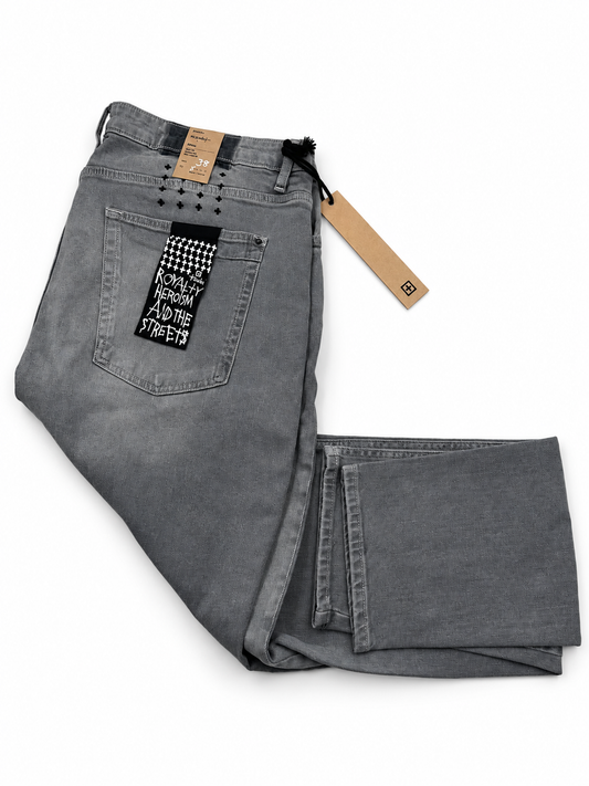 Folded back view of Ksubi grey jeans