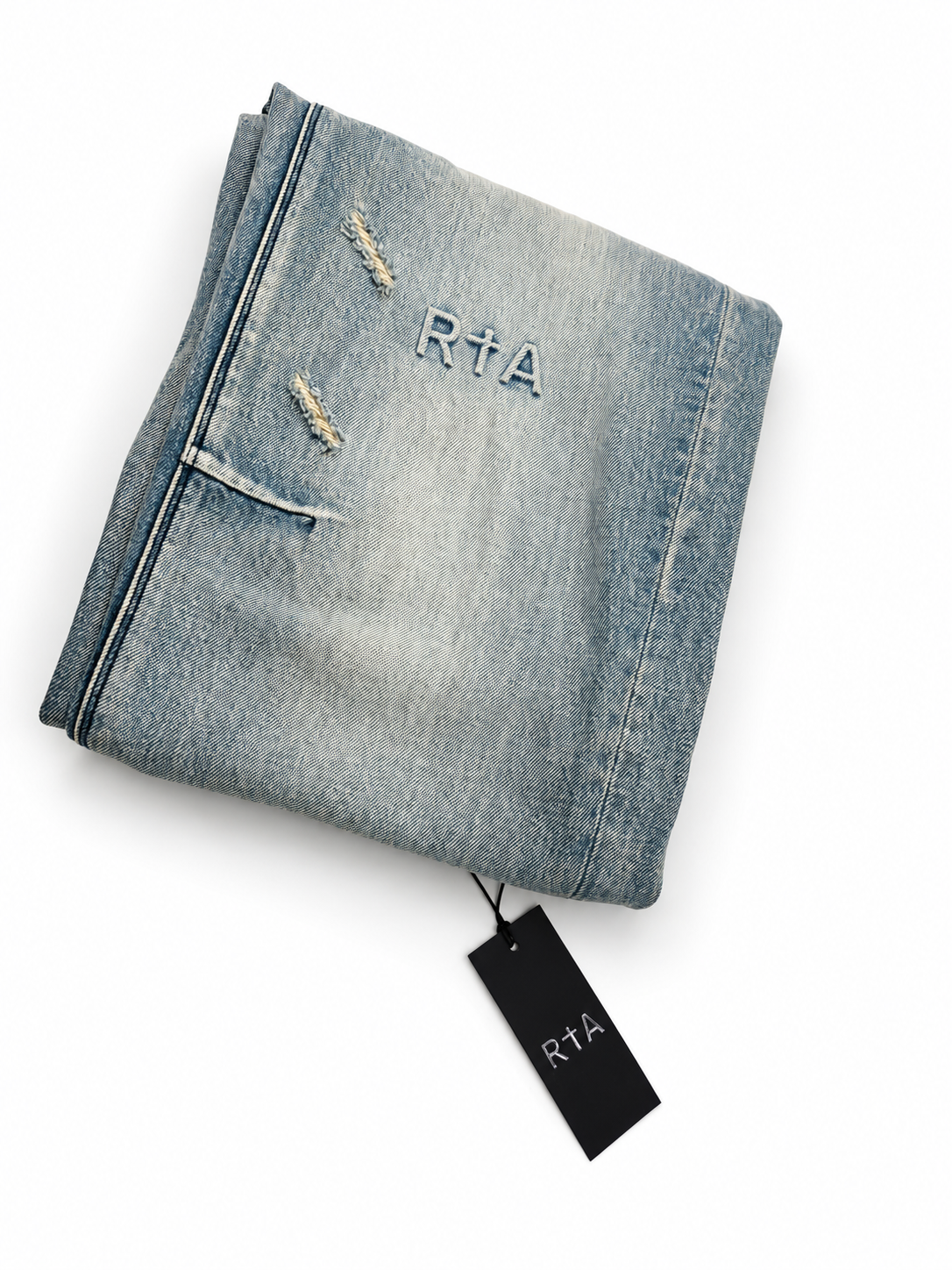 RtA tonal thigh embroidery and distressed denim detail