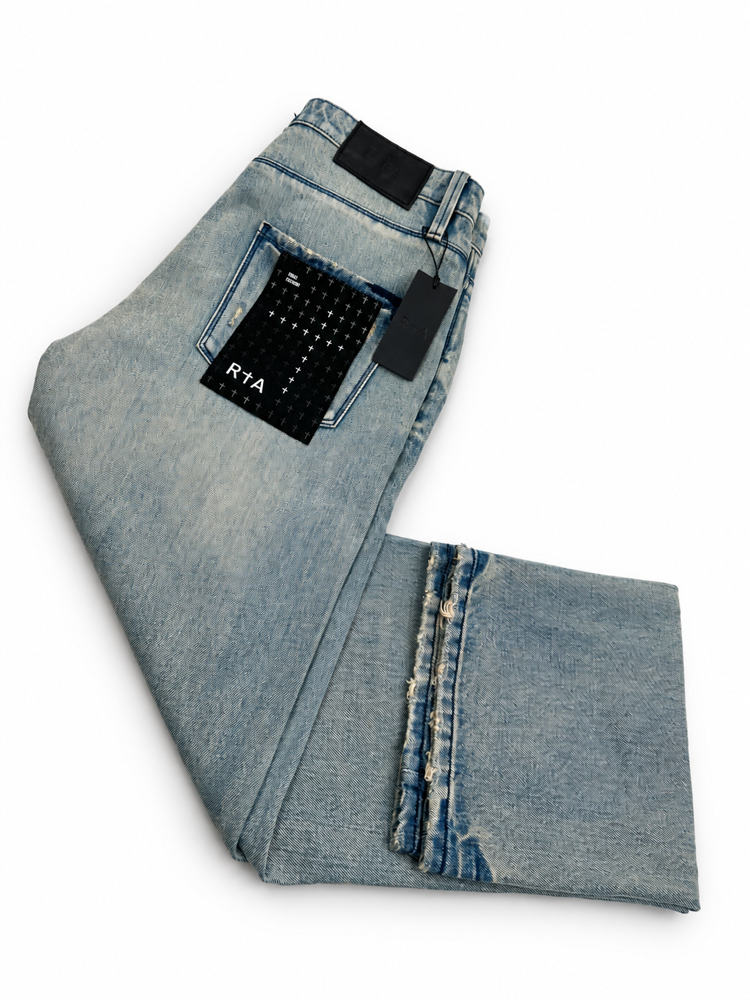 RtA Jonas straight leg jeans showing distressed hem