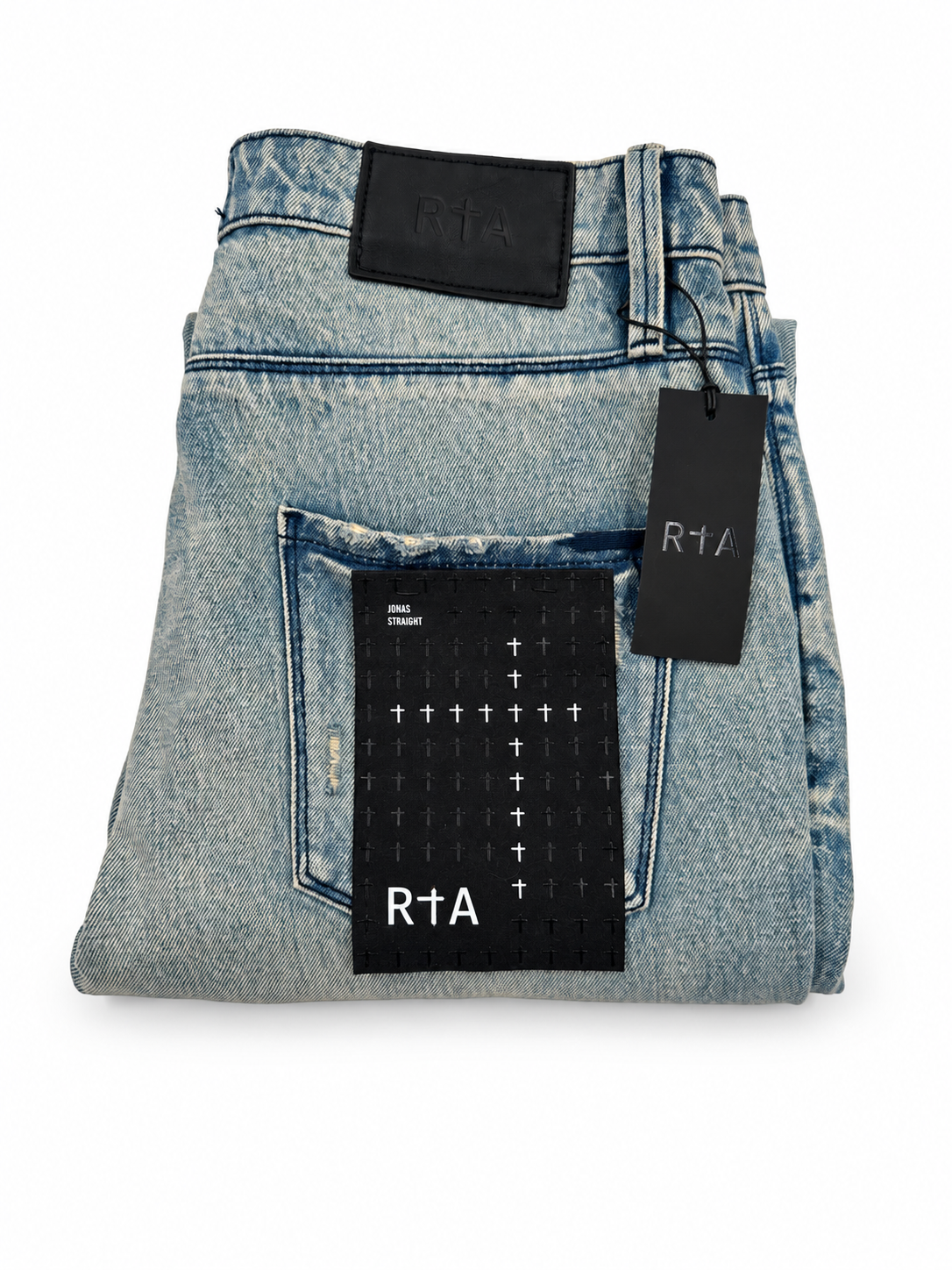 RtA jeans back pocket and tags close-up